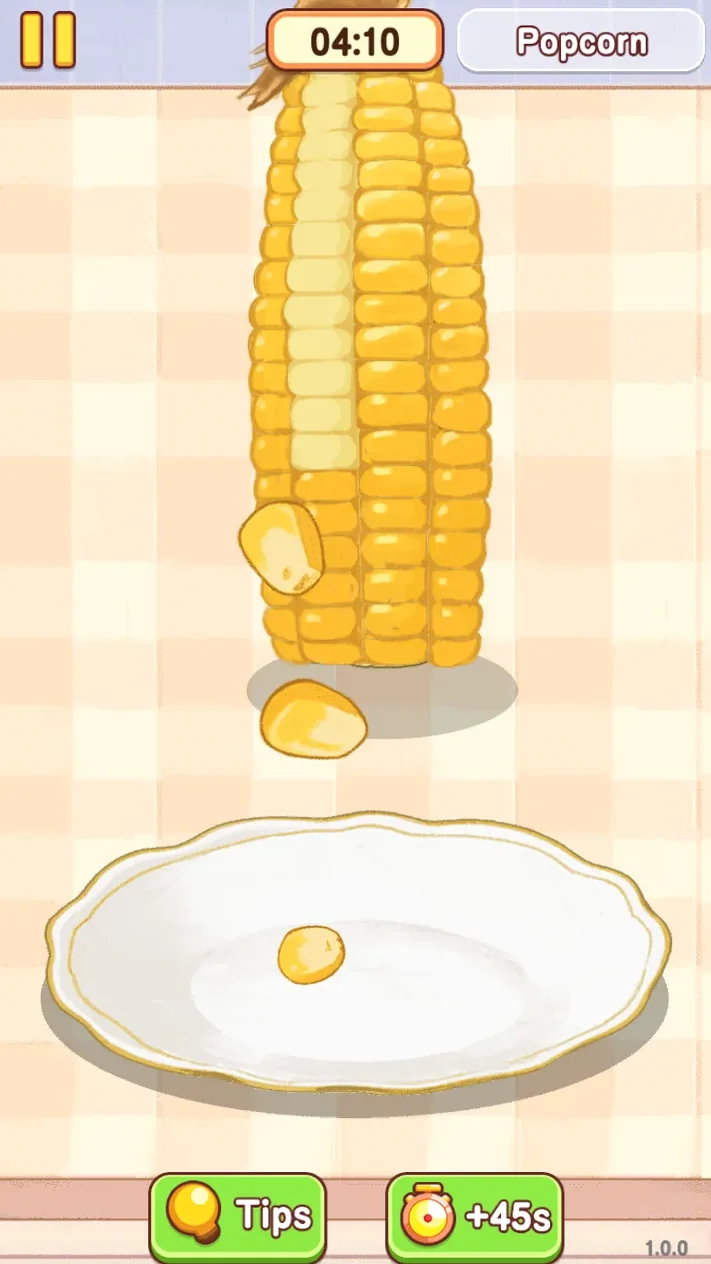 Corn kernels falling from the cob into a white plate