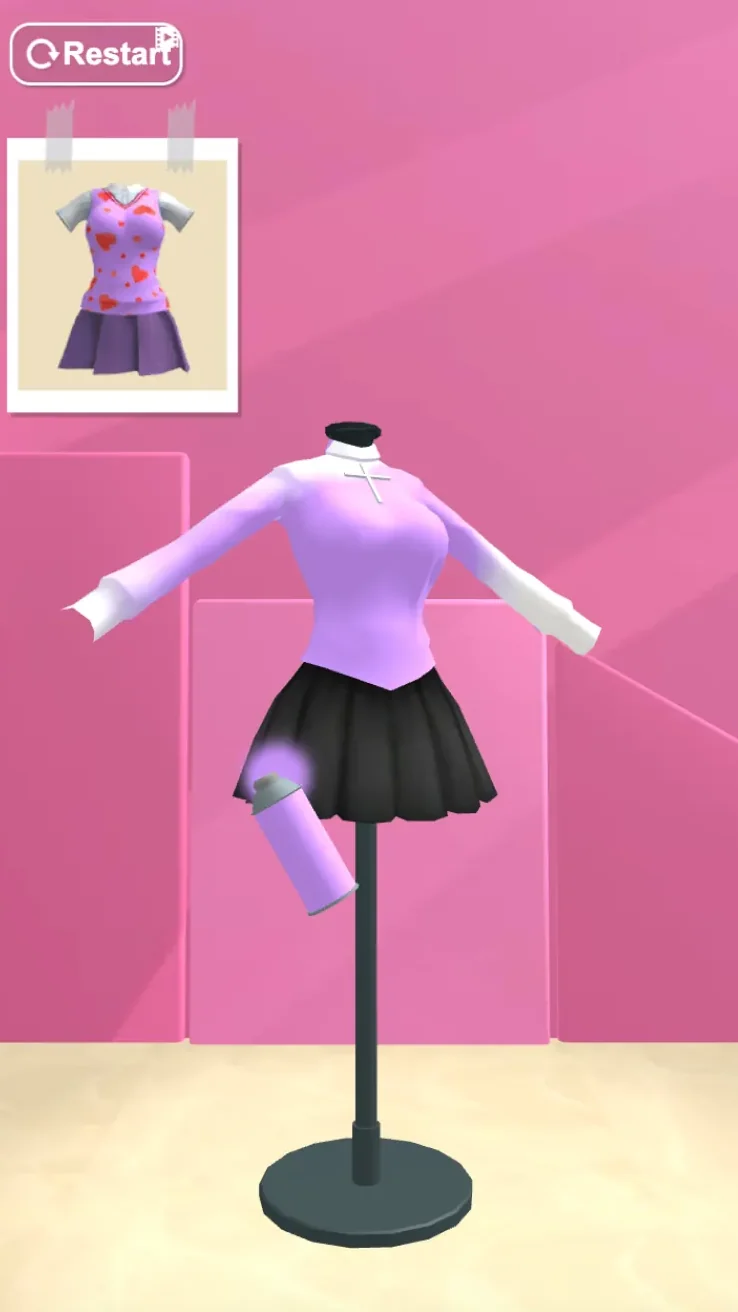 Purple spray can coloring the top on the Fashion Girl mannequin